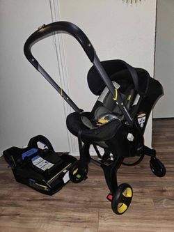 Doona Infant Car Seat Stroller with Base