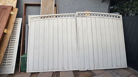 Wooden and iron patio door, 64 inches wide x 72 1/2 inches high (from the wall).