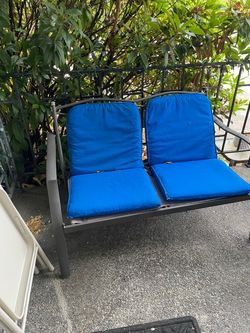 Outdoor Metal Loveseat with Blue Cushions