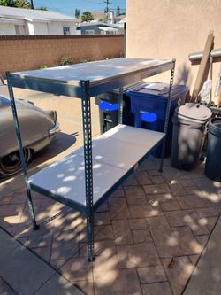 LARGE STORAGE RACK HEAVY DUTY HANDLEA A LOT OF WEIGHT