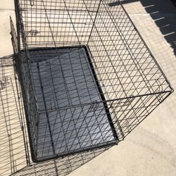 Large dog crate with two doors $40