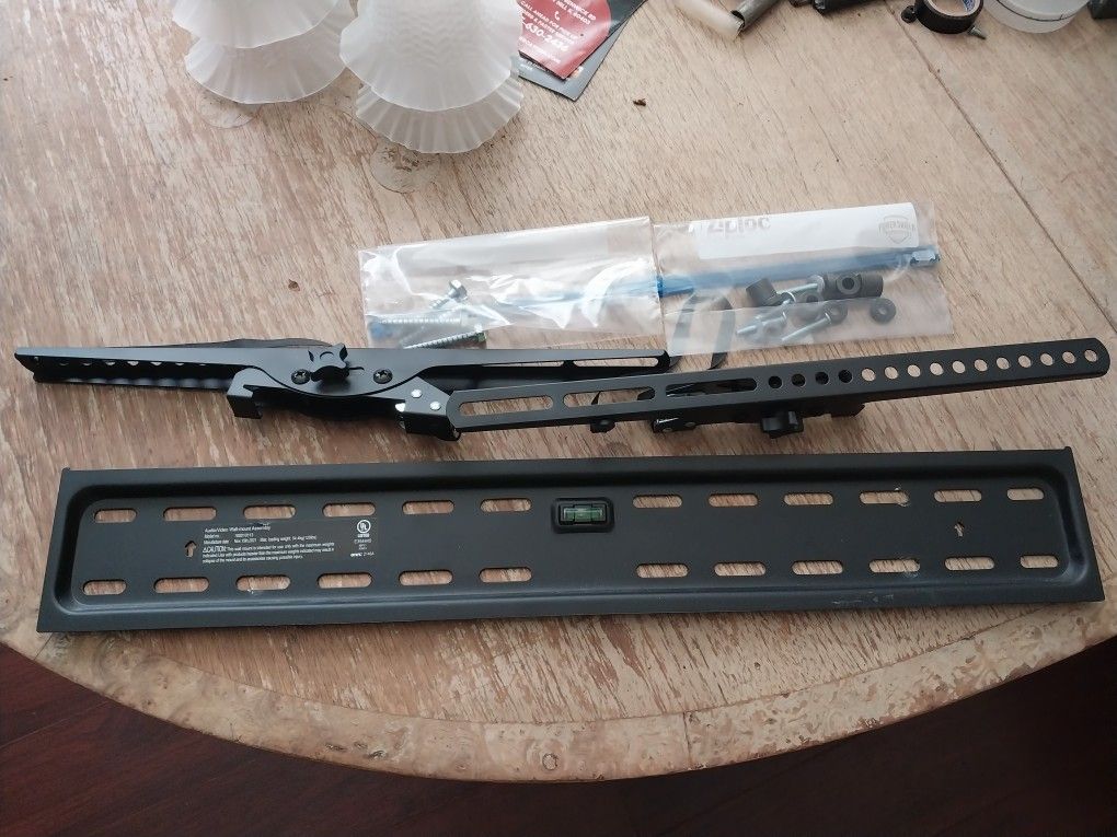 Tv Wall Mount Tilting TV Wall Mount for 50" to 86" TV's, up to ±12° Tilting Used once Fabulous Condition