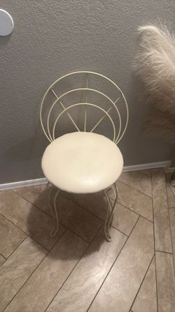 vintage white wrought iron vanity chair features a fan-shaped backrest and a round padded seat