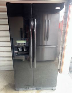 Black whirlpool refrigerator and freezer