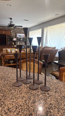 Set of 7 iron candlesticks