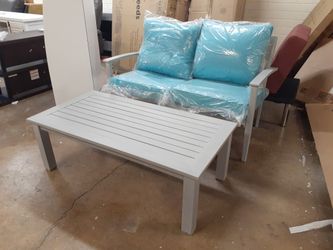 New cosco LOVESEAT with coffe table cushions included