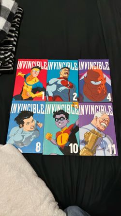 Invincible comics! Volumes 1, 2, 4, 8, 10, and 11!