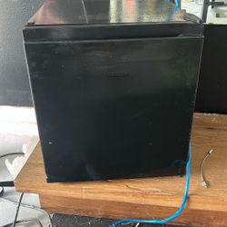 Refrigerator And table stand