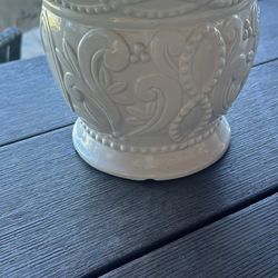 Pretty elegence in this white etched ceramic glazed pot