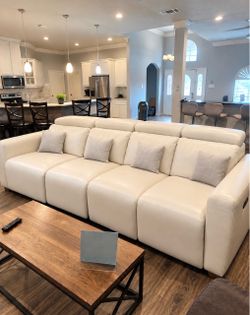 White leather recliner sofa