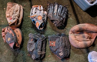 Baseball gloves and bats