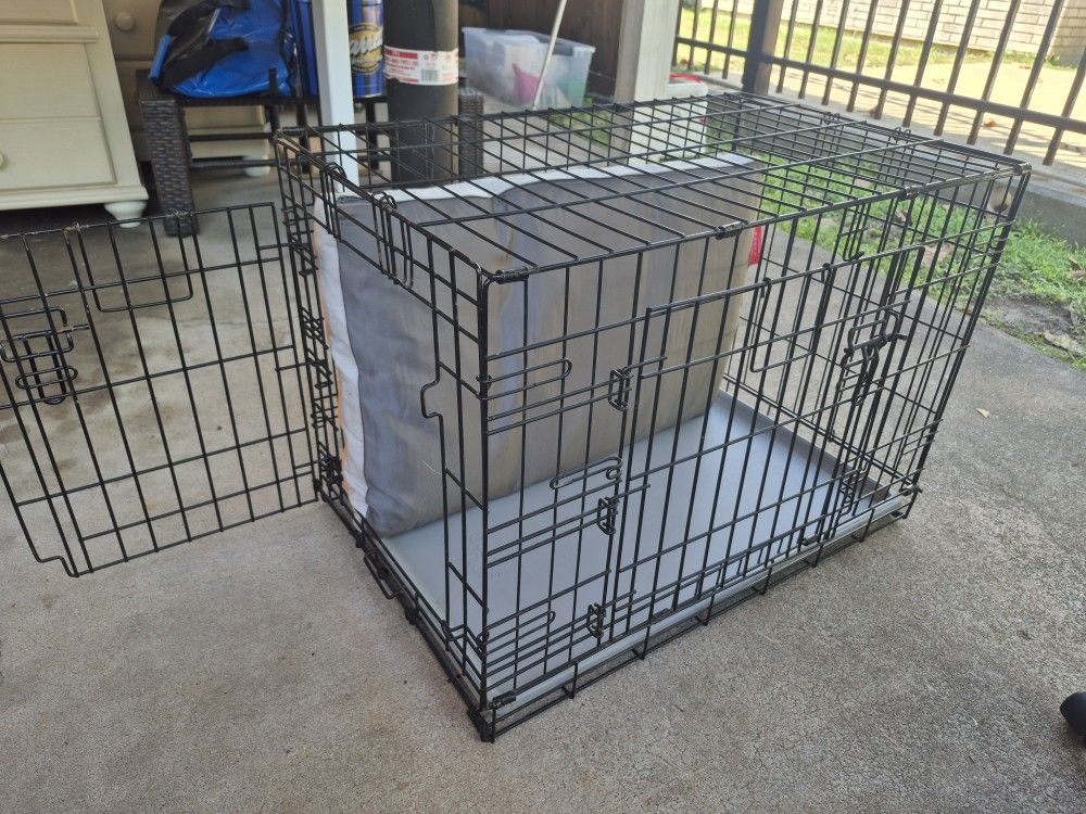 Nice Used Medium Foldable Pet Crate. With Cushion.