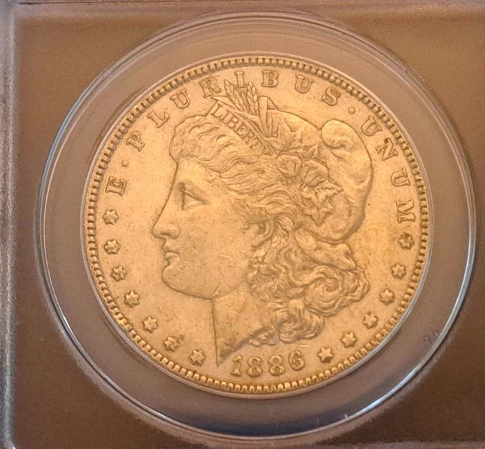 1886 Morgan Silver Dollar ANACS AU50 - Genuine