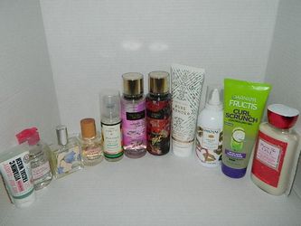 11 bottles of mix women perfumes,creams,wash