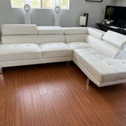 New White Leather Sectional With Adjustable Headrests.  106” X 77”.  Free Delivery!