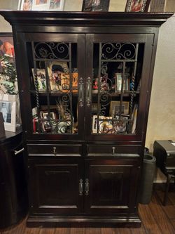 78"H dark brown display cabinet