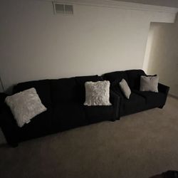 Two Couches With 4 pillows 