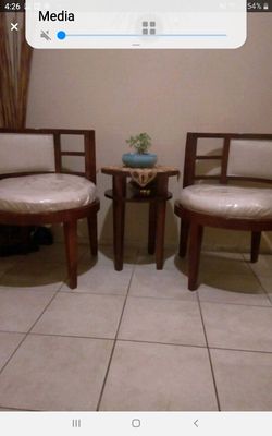 2 chairs with table