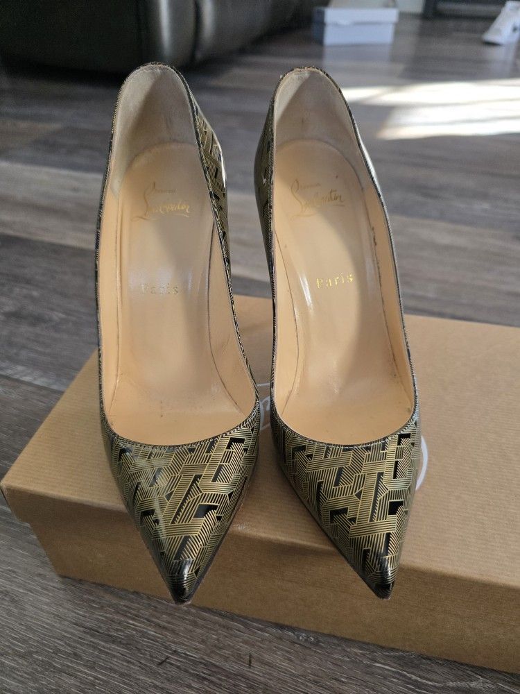 Christian Louboutin 37.5  