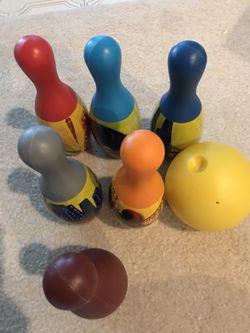 Six bowling pins and ball set