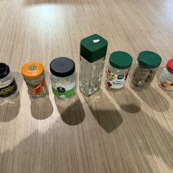Assorted empty glass jars with lids