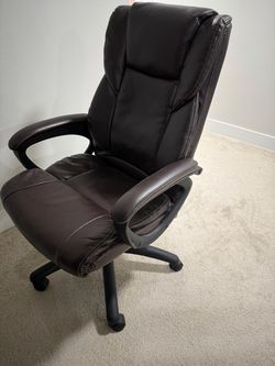 Brown faux leather executive chair
