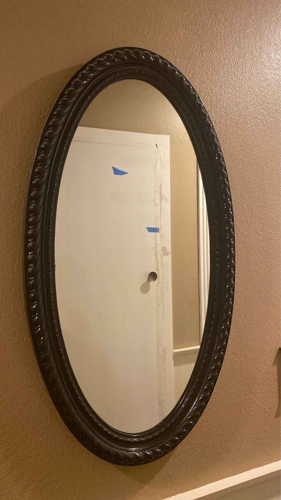 Large oval mirror