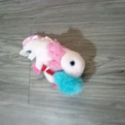 Axolotl and thing 1 plushies