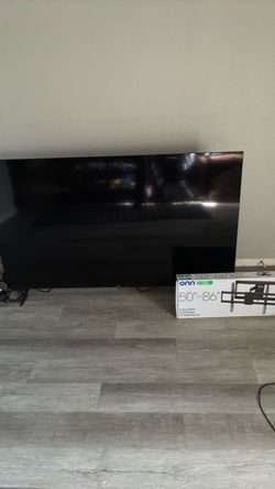 75in flat screen with full motion wall mount
