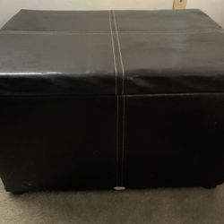 Black leather ottoman storage chest