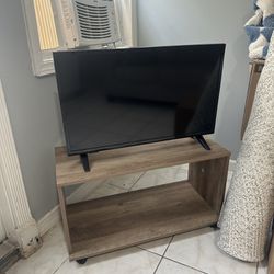 Insignia 32 inch TV with Rolling Stand