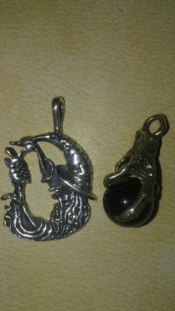 Dragon claw with black stone.with chains .sterling silver