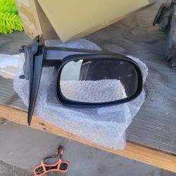side mirror on the left side of a charger car from 2006 to 2009 is new