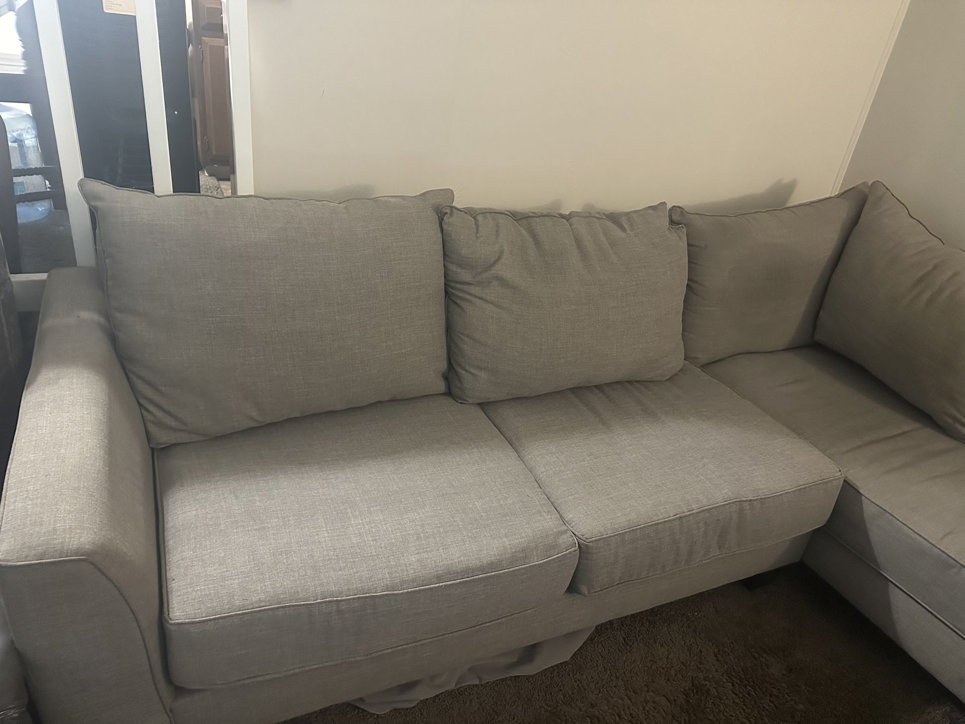 Light gray sectional couch