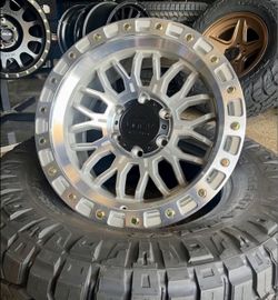 Super Sale. On RACELINE 17x9 6x139.7 8x165.1 machine wheels & 35x12.50-17 NITTO Ridge Grappler tires (We Finance)
