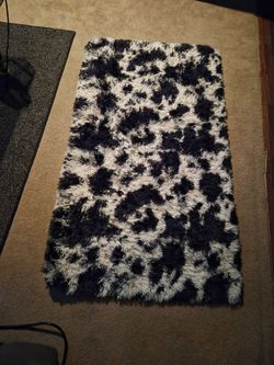 Cow print rug