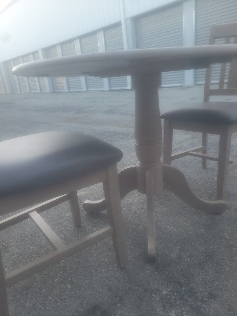 kitchen table and two chairs