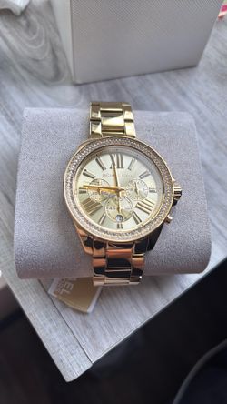 White gold woman’s Michael Kors watch