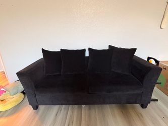 Large velvet black couch