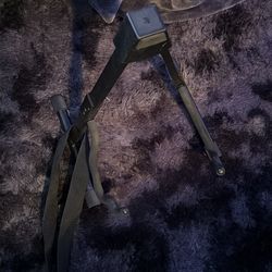 Guitar stand with a strap