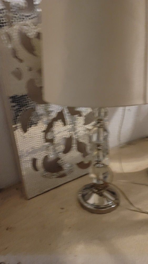 Glass Ball Lamp With White Shade And Mirror Wall Art