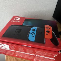 Nintendo Switch (Neon Red/Blue) – Like New Condition