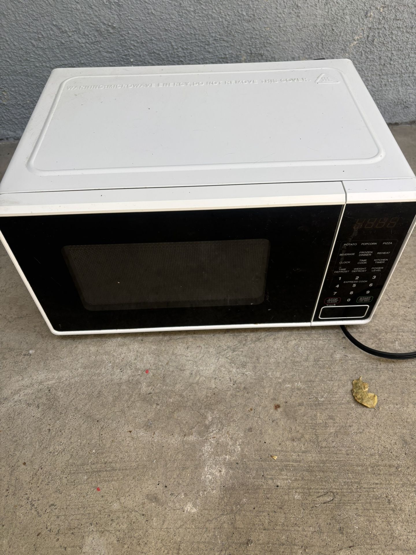 Small white microwave 9 inch