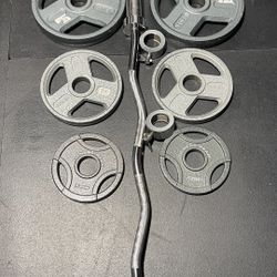 OLYMPIC CURLBAR AND WEIGHTS 