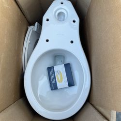 KOHLER Highline Arc 12 In. Rough In 2-Piece 1.28 GFP Single Flush Round Chair Height Toilet In White With Soft Close Seat 