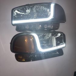 99-06 YUKON SIERRA HEADLIGHTS Smoked Amber LED 