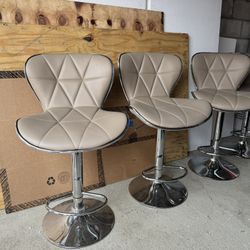 Four Adjustable Swivel Barstools