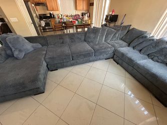Over sized like new sectional couches