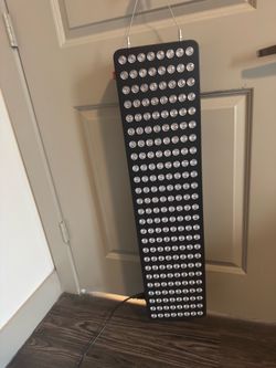 This is a red light therapy panel (full/half body LED panel)