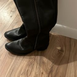 Born black leather, knee-high boots